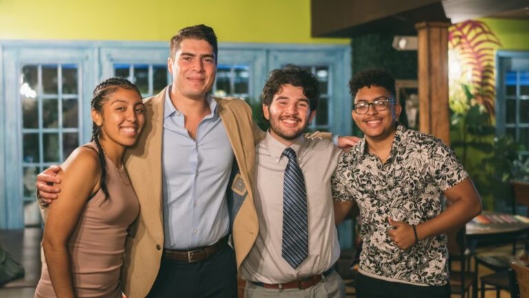 Circle Match Team of four smiling at 2022 Summer Dinner